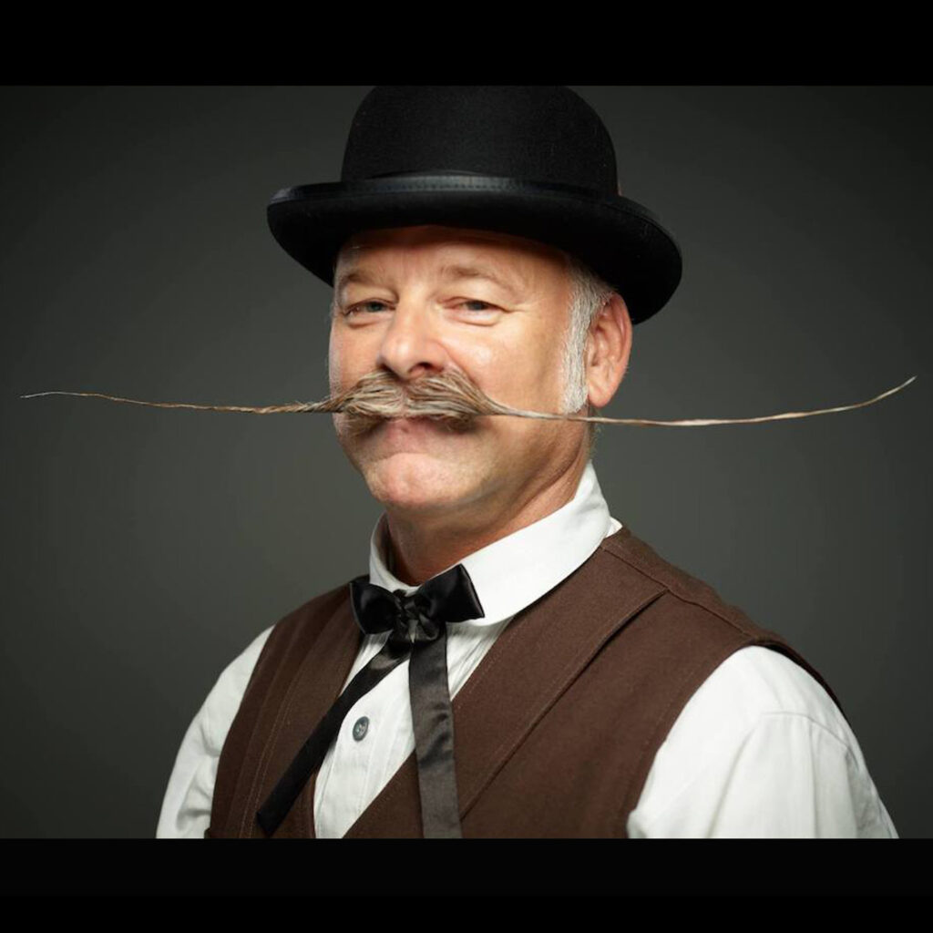 Local man from Summerville sets new Guinness World Record for the longest mustache